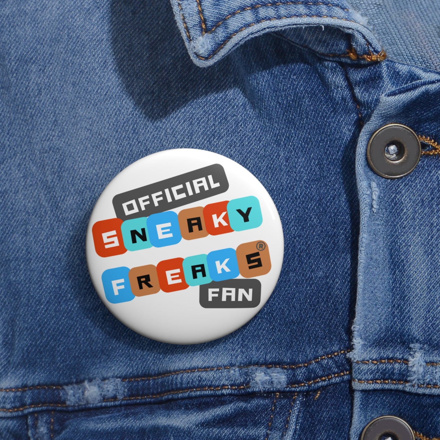 The Stick Anywhere OFFICAL SNEAKY FREAKS FAN BUTTON